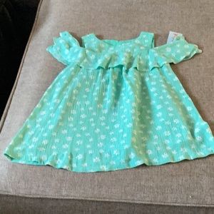 Toddlers size 3 sleeveless dress with tags on it